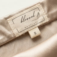 Falda Satinada Midi Claire | Marfil Champagne
