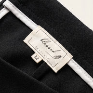 Falda midi plisada Héloïse | Negro Clásico